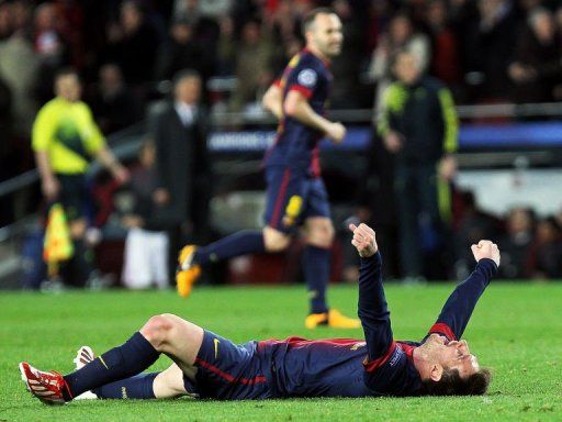 Barcelona&#039;s Argentinian forward Lionel Messi celebrates at Camp Nou stadium in Barcelona on March 12, 2013