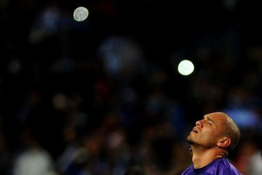 Porto&#039;s Maicon reacts after losing at La Rosaleda stadium in Malaga on March 13, 2013