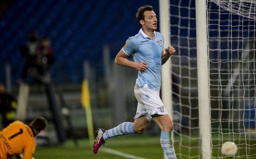 Lazio&#039;s Libor Kozak celebrates after scoring against Stuttgart at Rome&#039;s Olympic stadium, on March 14, 2013