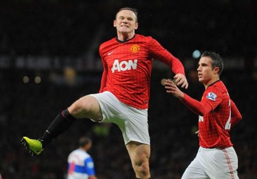 Manchester United's forward Wayne Rooney (L) celebrates after scoring at Old Trafford in Manchester, March 16, 2013