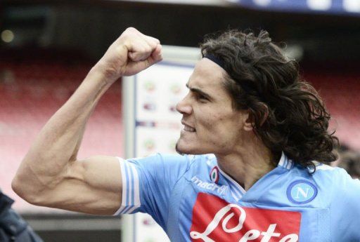 Napoli&#039;s Edinson Cavani celebrates after scoring at San Paolo Stadium in Naples on March 17, 2013