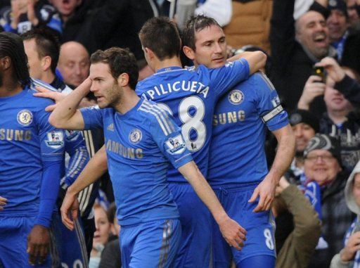 Chelsea&#039;s Frank Lampard (right) celebrates after scoring against West Ham at Stamford Bridge, on March 17, 2013