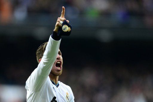 Sergio Ramos celebrates after scoring at the Santiago Bernabeu stadium in Madrid on March 2, 2013