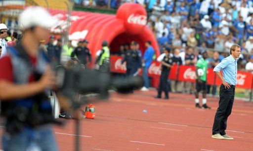 US coach Jurgen Klinsmann cuts a solitary figure during the World Cup qualifier at Honduras on February 6, 2013