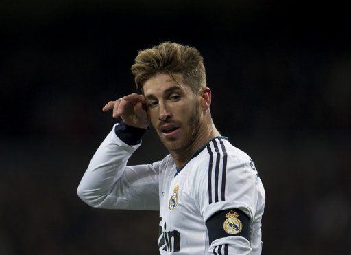Real Madrid&#039;s Sergio Ramos reacts at the Santiago Bernabeu stadium in Madrid on February 9, 2013