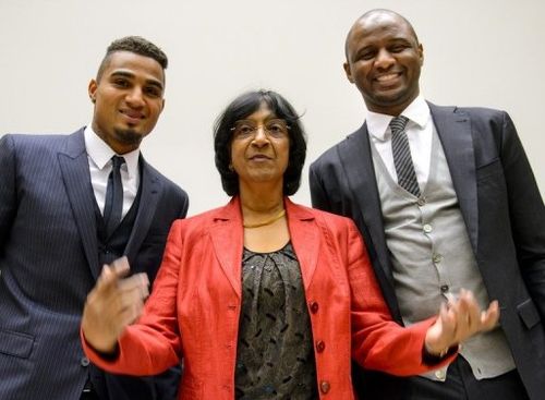 Kevin-Prince Boateng (L) and Patrick Vieira (R) pose with Navi Pillay on March 21, 2013 in Geneva