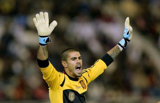 Spain&#039;s goalkeeper Victor Valdes reacts in Doha on February 6, 2013