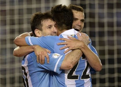 Argentina's players celebrate after scoring a penalty against Venezuela, in Buenos Aires, on March 22, 2013