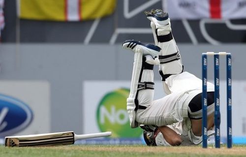 New Zealand's Tim Southee rolls over after making a run, at Eden Park in Auckland, on March 23, 2013