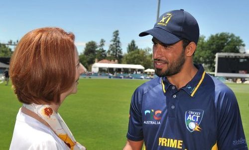 Fawad Ahmed meets Australian Prime Minister Julia Gillard in Canberra on January 29, 2013