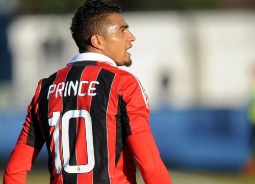 AC Milan's Kevin-Prince Boateng shouts towards fans during his side's friendly against Pro Patria, January 3, 2013