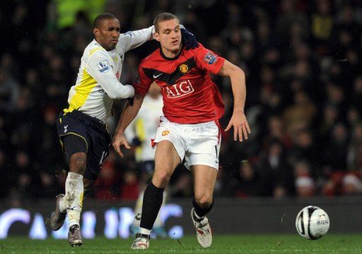 Tottenham Hotspur&#039;s Jermain Defoe and Manchester United&#039;s Nemanja Vidic, Old Trafford, Manchester, December 1, 2009