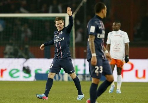 Paris Saint-Germain's forward Kevin Gameiro (L) celebrates after scoring in Paris on March 29, 2013