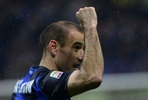 Inter Milan&#039;s Argentinian forward Rodrigo Sebastian Palacio celebrates after scoring on March 30, 2013