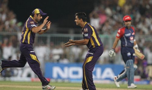 Rajat Bhatia celebrates with Gautam Gambhir after dismissing Virender Sehwag