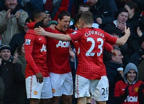 Manchester United's (L-R) Patrice Evra, Javier Hernandez, Shinji Kagawa and Tom Cleverley are pictured on March 10, 2013