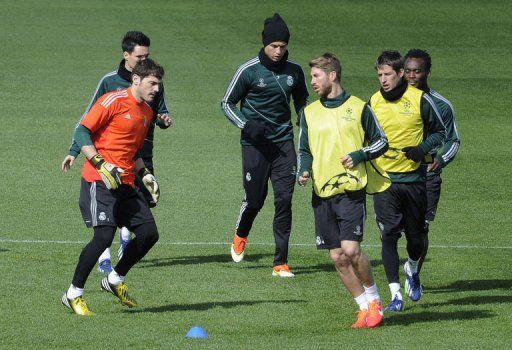 Real Madrid players take part in a training session at the Valdebebas training ground in Madrid, on April 2, 2013