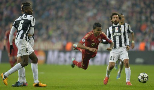 Midfielder Luiz Gustavo takes a tumble during the Champions League quarter-final home to Juventus on April 2, 2013
