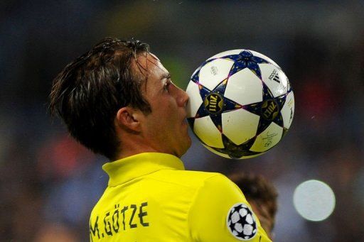 Dortmund&#039;s Mario Goetze controls the ball in Malaga on April 3, 2013