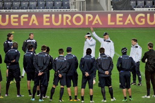 Lazio coach Vladimir Petkovic gestures to his players during a training session on April 3, 2013