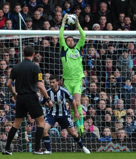 West Brom&#039;s goalkeeper Ben Foster makes a save during their match against West Ham, at Upton Park, on March 30, 2013