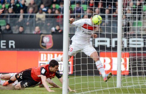 Paris Saint-Germain&#039;s forward Zlatan Ibrahimovic (R) scores a goal on April 6, 2013 in Rennes, western France