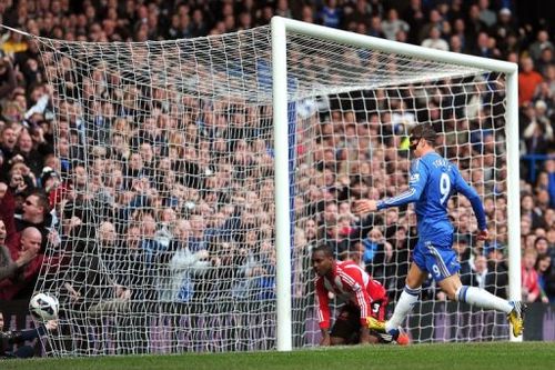 Chelsea's Fernando Torres follows the ball in the goal after an own goal on April 7, 2013