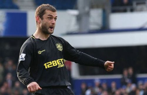 Wigan Athletic's Shaun Maloney reacts after scoring at the Loftus Road Stadium in London on April 7, 2013