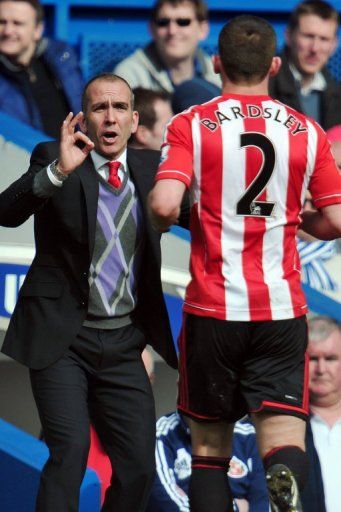 Paolo Di Canio gives instructions to defender Phil Bardsley during the loss at Chelsea on April 7, 2013