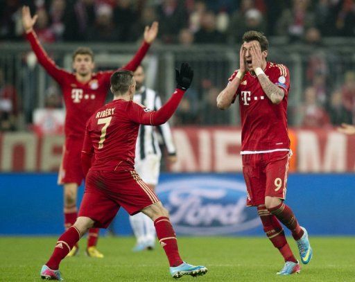 Bayern Munich&#039;s Mario Mandzukic (R) and Franck Ribery are pictured during their match against Juventus on April 2, 2013