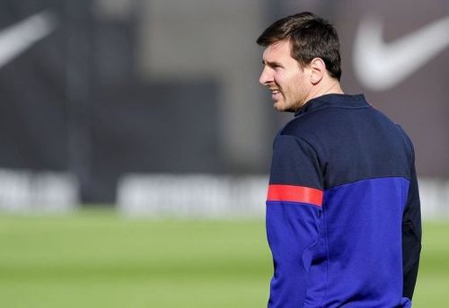 Barcelona's Lionel Messi takes part in a training session near Barcelona, on April 9, 2013