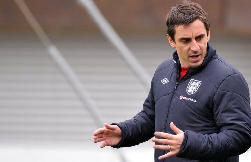 England assistant coach Gary Neville at a training session at the St George&#039;s Park training complex on March 19, 2013