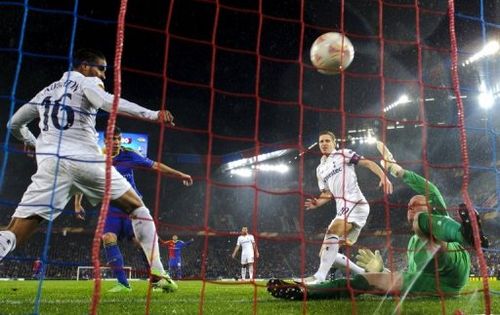 FC Basel's Aleksandar Dragovic (2nd L) scores his team's second goal against Tottenham Hotspur April 11, 2013