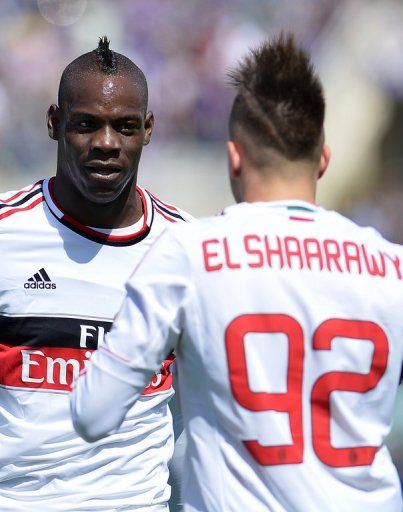 AC Milan&#039;s Mario Balotelli (L) and Stephan El Shaarawy, pictured in Florence, on April 7, 2013