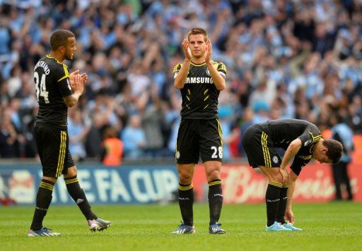 Chelsea players acknowledge their fans at the end of the FA Cup semi-final at Wembley on April 14, 2013