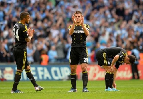 Chelsea players acknowledge their fans at the end of the FA Cup semi-final at Wembley on April 14, 2013