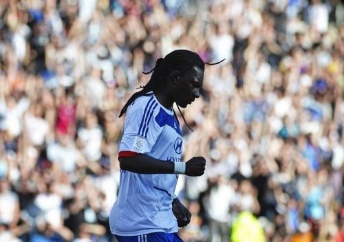 Lyon's Bafetimbi Gomis reacts after scoring on April 14, 2013, at the Gerland Stadium in Lyon