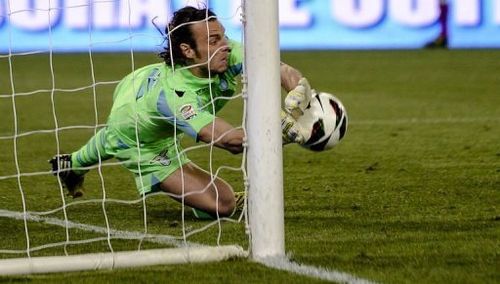 Lazio's goalkeeper Federico Marchetti makes a save on April 15, 2013 at Rome's Olympic stadium