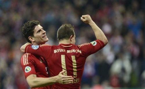 Bayern Munich's Mario Gomez (L) and Xherdan Shaqiri (R) celebrate in Munich on April 16, 2013