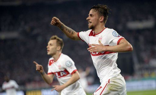 Stuttgart&#039;s Martin Harnik (R) and teammate Alexandru Maxim celebrate in Stuttgart, southern Germany, on April 17, 2013