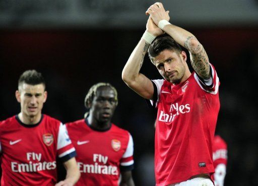 Arsenal&#039;s Olivier Giroud (R), pictured after their match against Everton, in London, on April 16, 2013