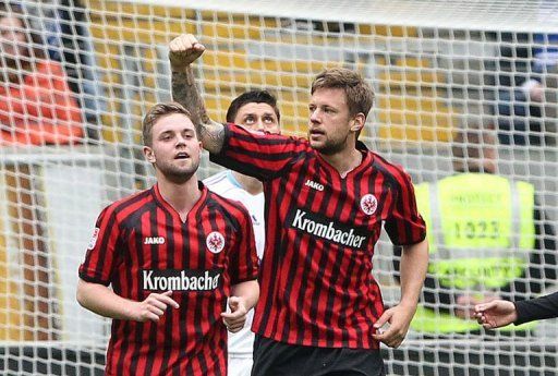 Frankfurt&#039;s defender Marco Russ (R) celebrates after scoring in Frankfurt, central Germany, on April 20, 2013