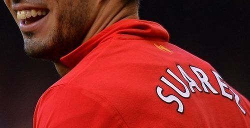 Liverpool's Uruguayan striker Luis Suarez smiles during the match against Chelsea on April 21, 2013