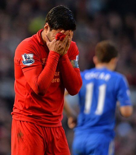 Liverpool&#039;s Luis Suarez reacts in Liverpool, on April 21, 2013