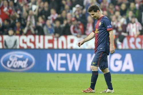 Barcelona's Lionel Messi trudges off after defeat in the UEFA Champions League on April 23, 2013