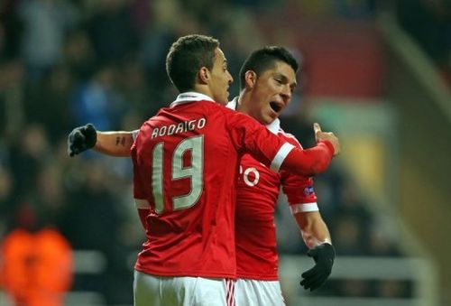 Benfica's Rodrigo (L) and Enzo Perez are pictured during a Europa League match in Newcastle, England on April 11, 2013