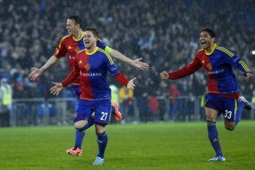 FC Basel's Markus Steinhoefer (C) and Mohamed Elneny (R) are pictured during a Europa League match on April 11, 2013