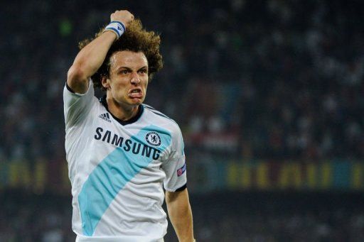 Chelsea&#039;s defender David Luiz celebrates after scoring against Basel at the St Jakob stadium in Basel on April 25, 2013