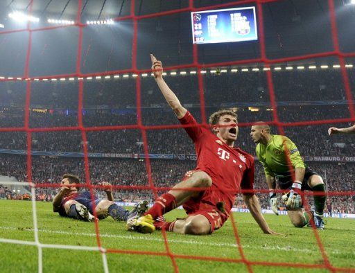 Thomas Mueller scores his second goal during the UEFA Champions League semi-final against Barcelona on April 23, 2013