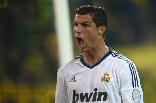 Cristiano Ronaldo celebrates scoring his leveller in the UEFA Champions League semi-final on April 24, 2013